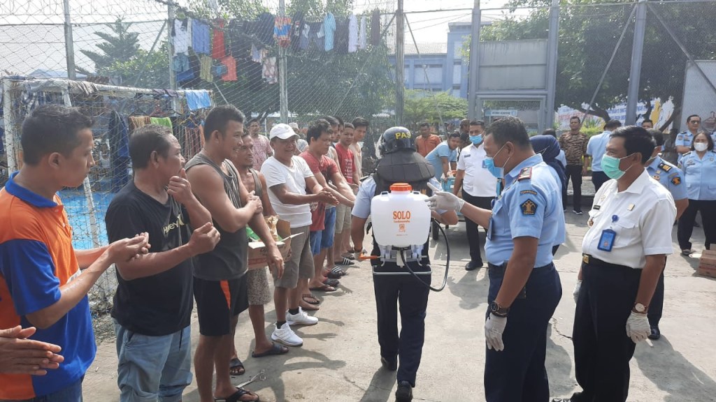 This image has an empty alt attribute; its file name is political-prisons-and-covid.jpg